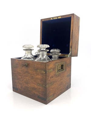 Lot 198 - A 19th Century oak and brass bound decanter...
