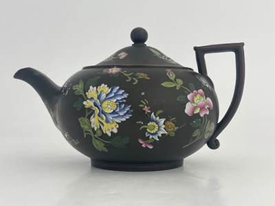 Lot 1030 - A Wedgwood black basalt Capriware teapot,...