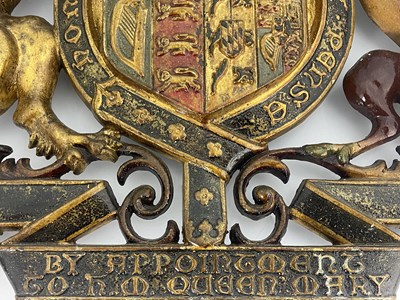 Lot 214 - A cast iron and enamelled Royal Warrant, for...