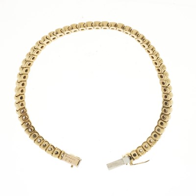 Lot 151 - Boodles, an 18ct gold diamond line bracelet