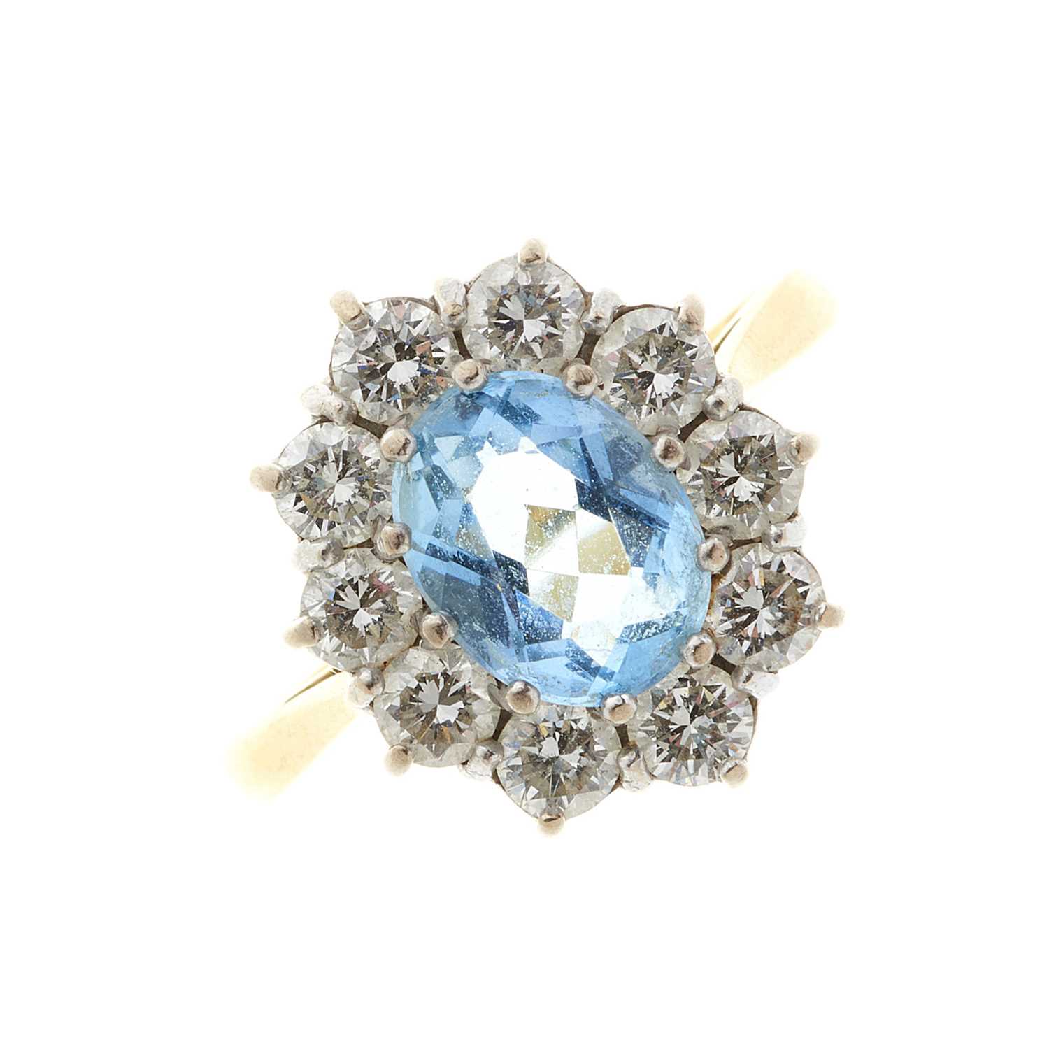 Lot 75 - An 18ct gold aquamarine and diamond cluster dress ring