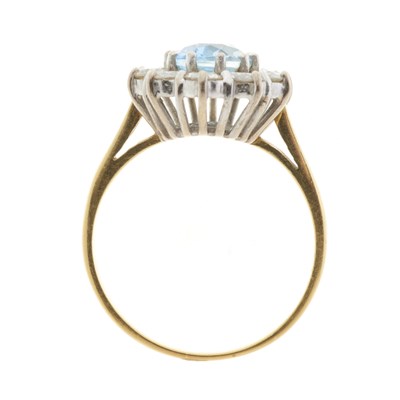 Lot 75 - An 18ct gold aquamarine and diamond cluster dress ring