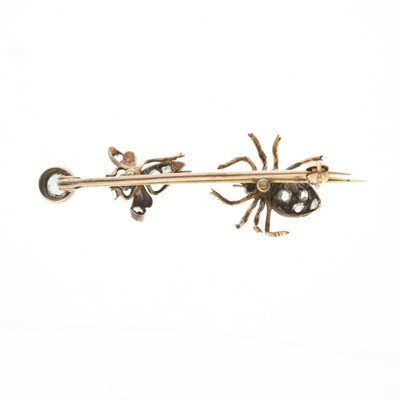 Lot 99 - A late Victorian gold, ruby and diamond fly and spider brooch