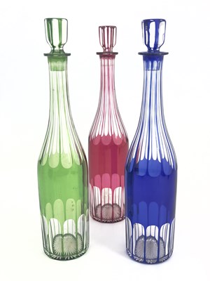 Lot 483 - Three Bohemian coloured cased glass liqueur...