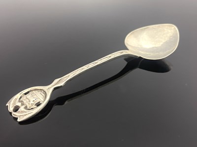 Lot 75 - A E Jones, an Arts and Crafts silver spoon,...