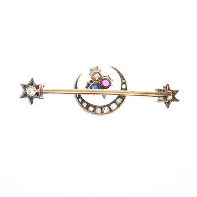 Lot 104 - A late Victorian ruby, sapphire and diamond shamrock crescent brooch