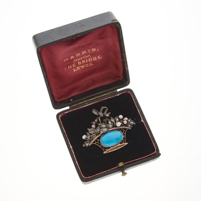 Lot 26 - A late Georgian silver and gold turquoise, diamond and pearl floral basket brooch