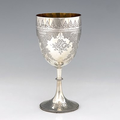 Lot 325 - A Victorian silver goblet, the body decorated...