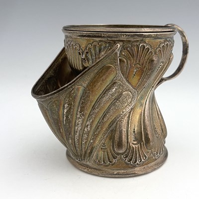 Lot 342 - A Victorian silver shaving mug, the exterior...