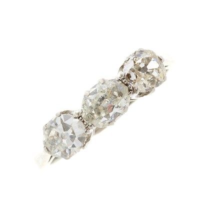 Lot 111 - An Art Deco platinum diamond three-stone ring