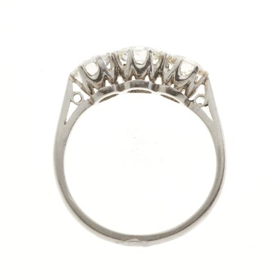Lot 111 - An Art Deco platinum diamond three-stone ring
