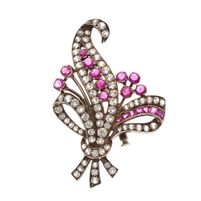 Lot 205 - A 1940s gold and silver ruby and white sapphire spray brooch