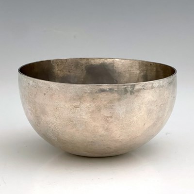 Lot 385 - A twentieth-century silver-coloured metal bowl,...