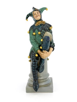 Lot 886 - Charles Noke for Royal Doulton, The Jester,...