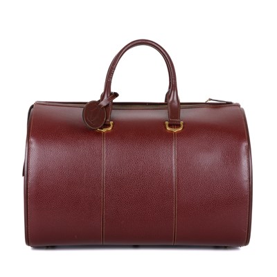 Lot 300 - Cartier, a large vintage Bordeaux travel bag,...