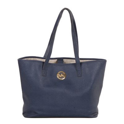 Lot 424 - Michael Kors, a Jet Set travel tote, crafted...