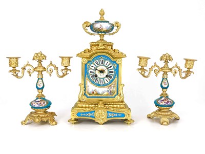Lot 549 - A French porcelain and ormolu mounted clock...