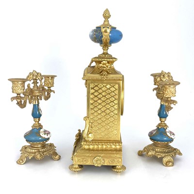 Lot 549 - A French porcelain and ormolu mounted clock...