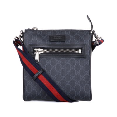 Lot 353 - Gucci, a black supreme messenger bag, crafted...