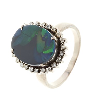 Lot 120 - A mid 20th century 18ct gold black opal doublet and diamond cluster ring