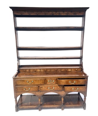 Lot 612 - A George III country oak dresser. circa 1770,...