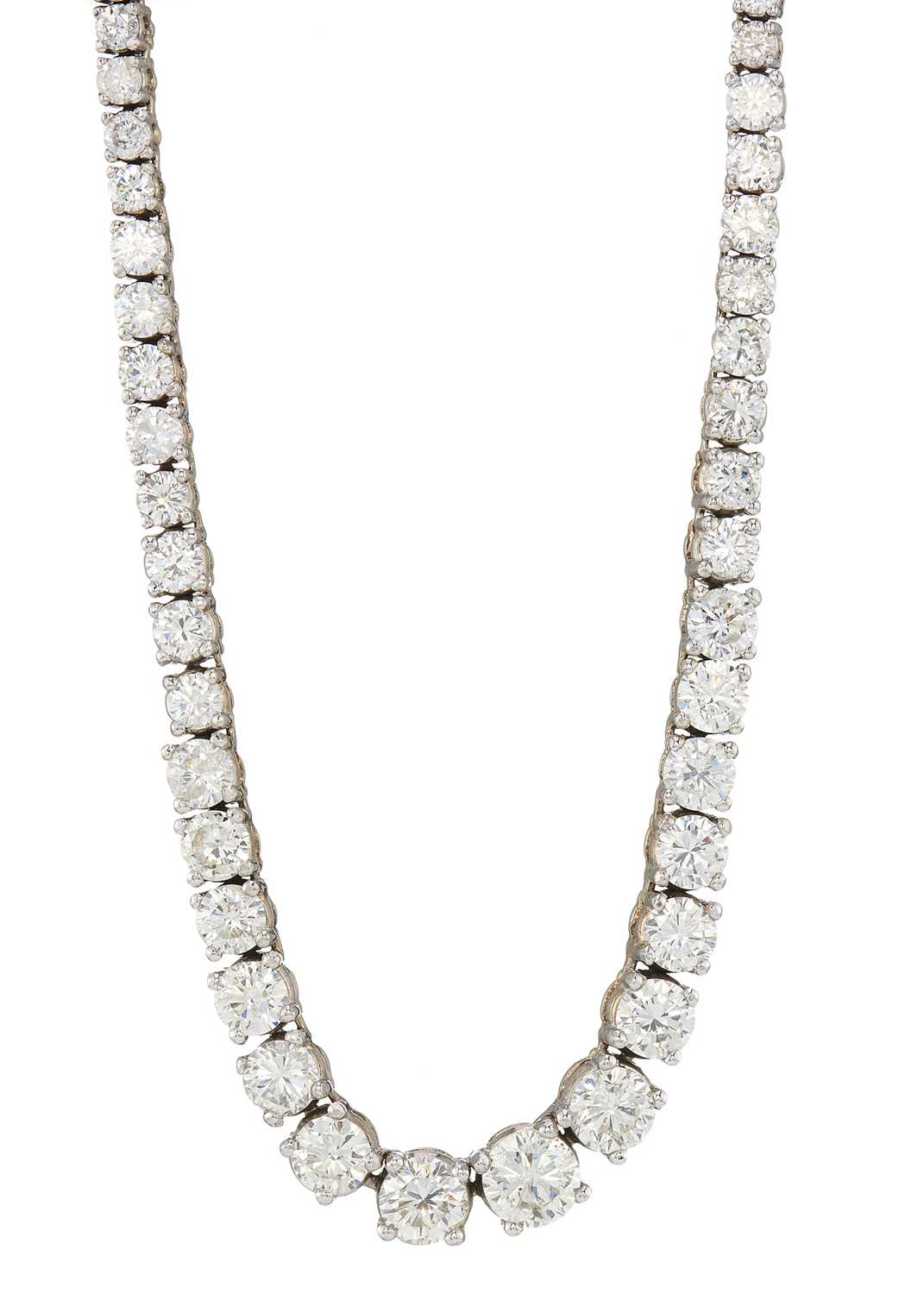 Lot 87 - An impressive diamond line riviere necklace