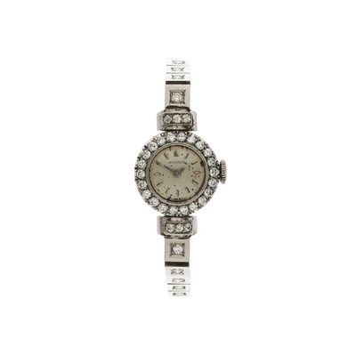 Lot 246 - Movado, a platinum diamond bracelet watch