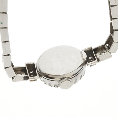 Lot 246 - Movado, a platinum diamond bracelet watch