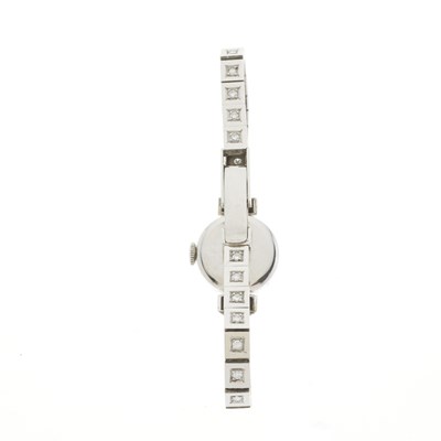 Lot 246 - Movado, a platinum diamond bracelet watch