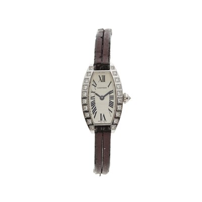 Lot 247 - Cartier, an 18ct gold diamond Lanieres Mini Tonneau wrist watch