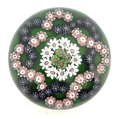 Lot 647 - Clichy, a millefiori garland glass paperweight,...