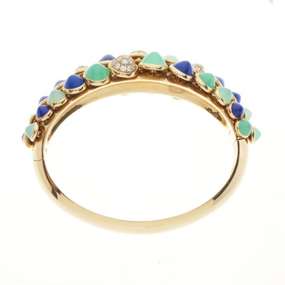 Lot 152 - Cartier, a diamond, lapis lazuli and chrysoprase Nouvelle Vague Mischievous bangle bracelet