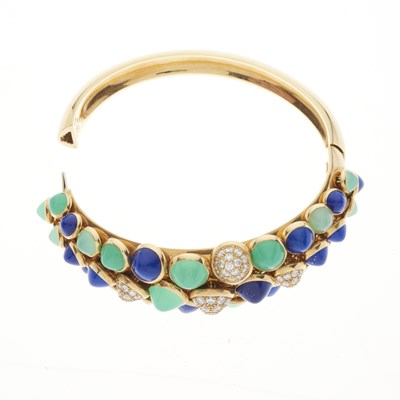 Lot 152 - Cartier, a diamond, lapis lazuli and chrysoprase Nouvelle Vague Mischievous bangle bracelet