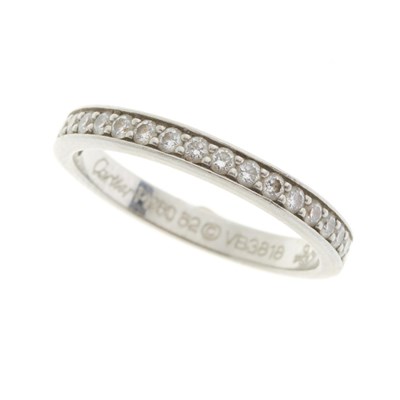 Lot 141 - Cartier, a platinum diamond 1895 half eternity ring