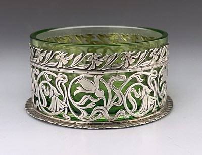 Lot 82 - An Arts and Crafts silver and glass dish,...
