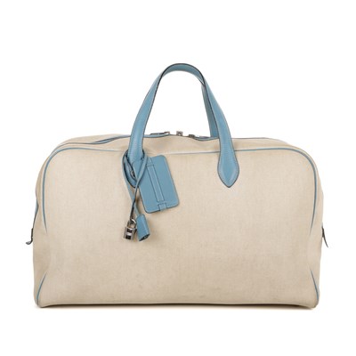 Lot 384 - Hermes, a 2000 toile Victora GM 50 travel bag,...