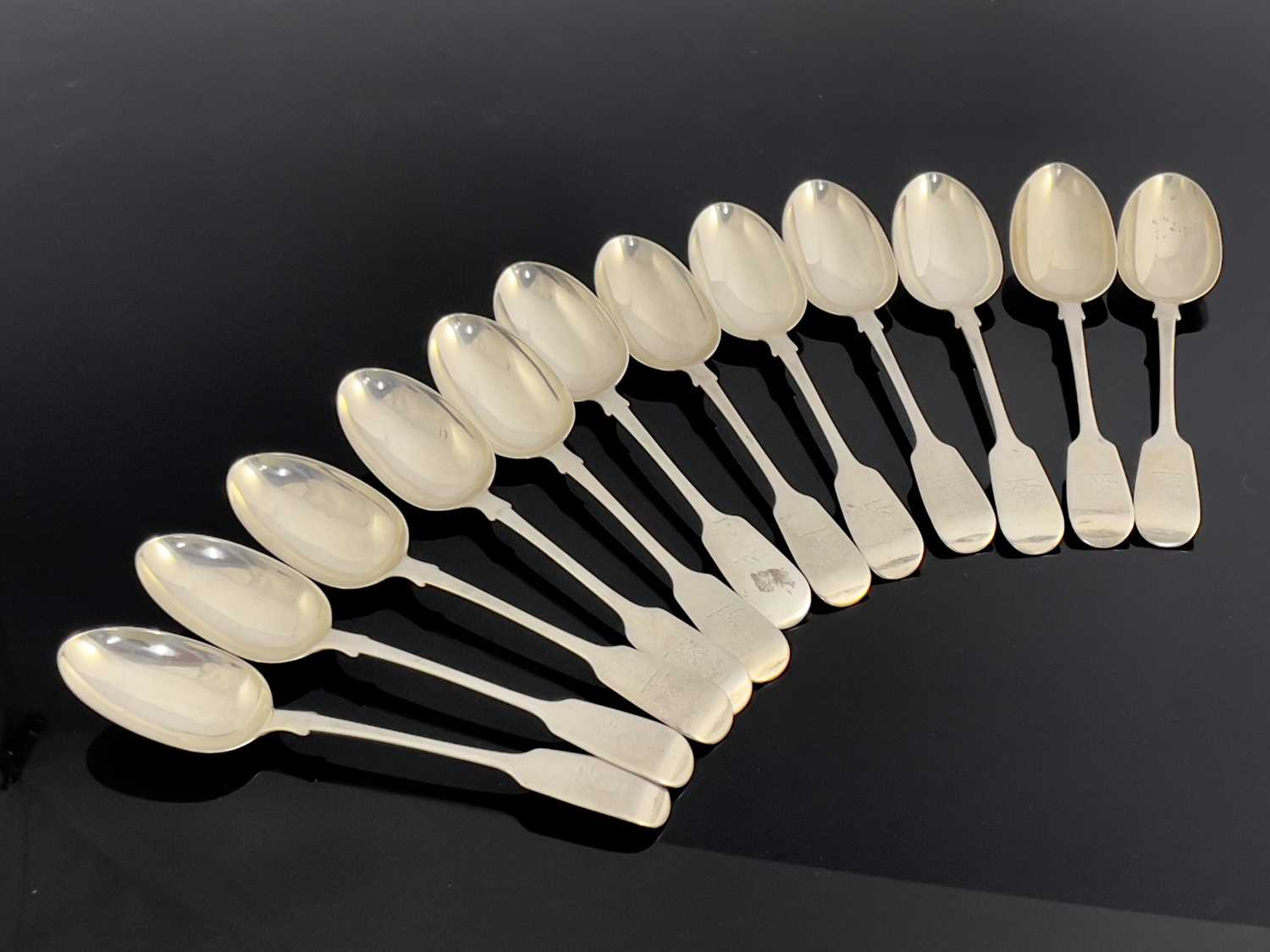 Lot 40 - A set of twelve Victorian silver table spoons,...