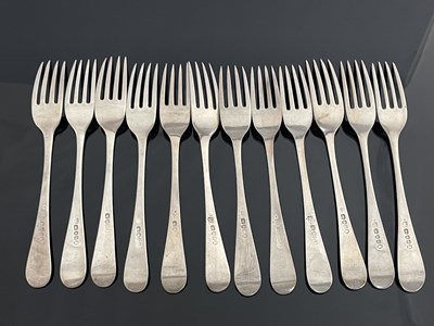 Lot 32 - A set of twelve Victorian silver table forks,...