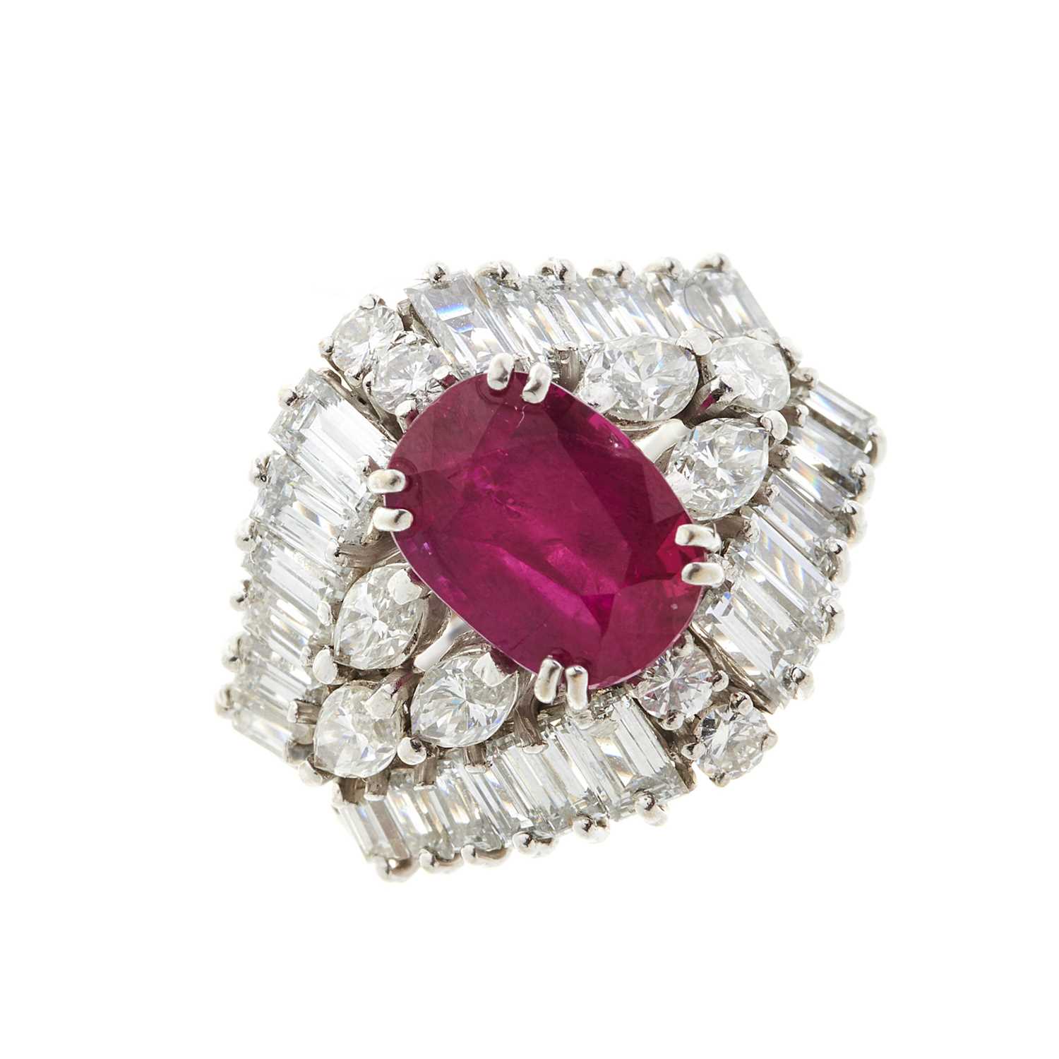 Lot 65 - An 18ct gold ruby and diamond cluster dress ring