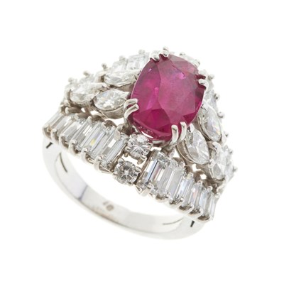 Lot 65 - An 18ct gold ruby and diamond cluster dress ring
