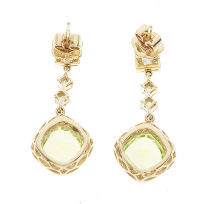 Lot 79 - A pair of 18ct gold peridot and diamond cluster drop earrings