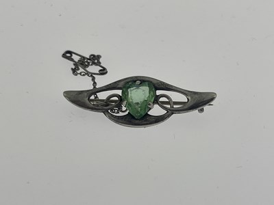 Lot 29 - An Arts and Crafts silver and green stone set...