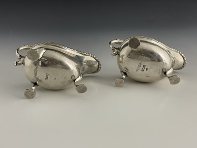 Lot 60 - A pair of Edwardian silver sauce boats,...