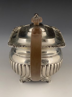 Lot 81 - An Edwardian silver teapot, William Hutton and...