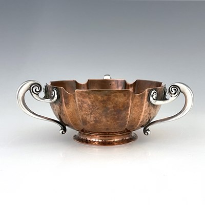Lot 86 - An Arts and Crafts silver handled copper bowl,...