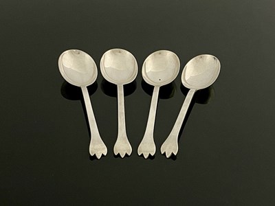 Lot 399 - A set of four Edwardian silver trefid-style...