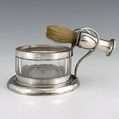 Lot 414 - An Edwardian silver mounted shaving mug, with...