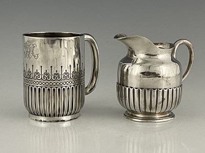 Lot 427 - A Victorian silver mug, of cylindrical form,...