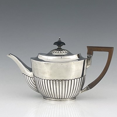 Lot 428 - A Victorian silver teapot, of ovoid form, the...