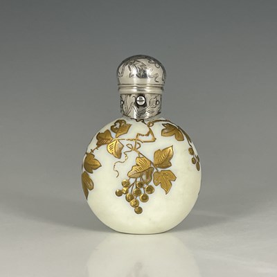 Lot 433 - A Victorian silver-mounted scent or perfume...